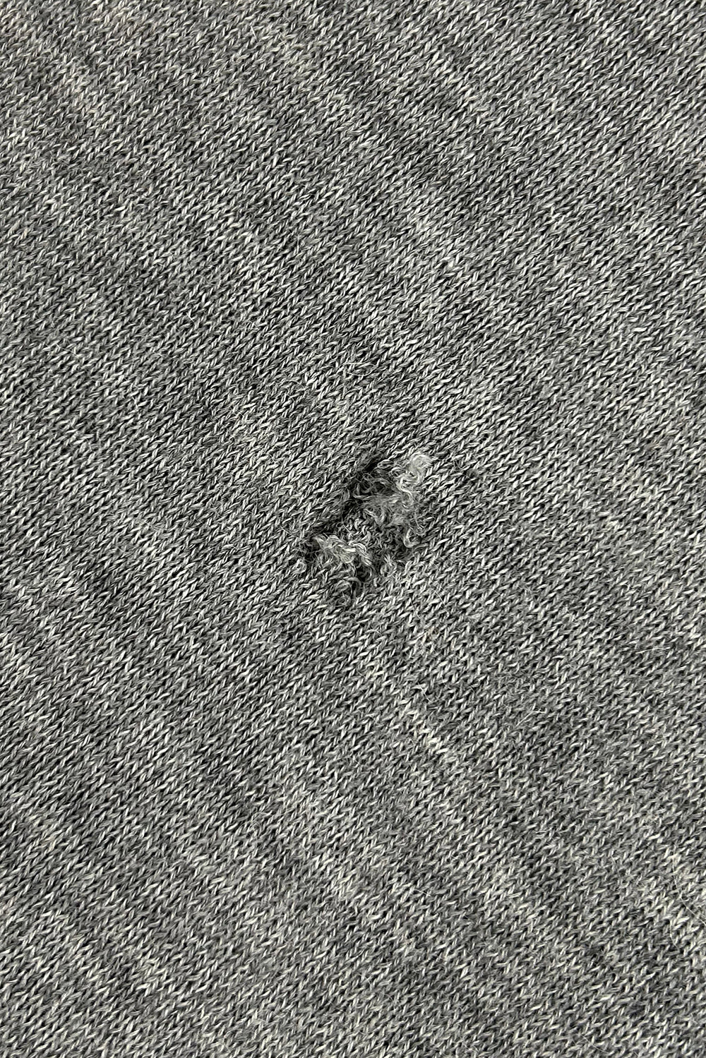 Single hole (diameter max 2cm) or seam tear (under 10cm)